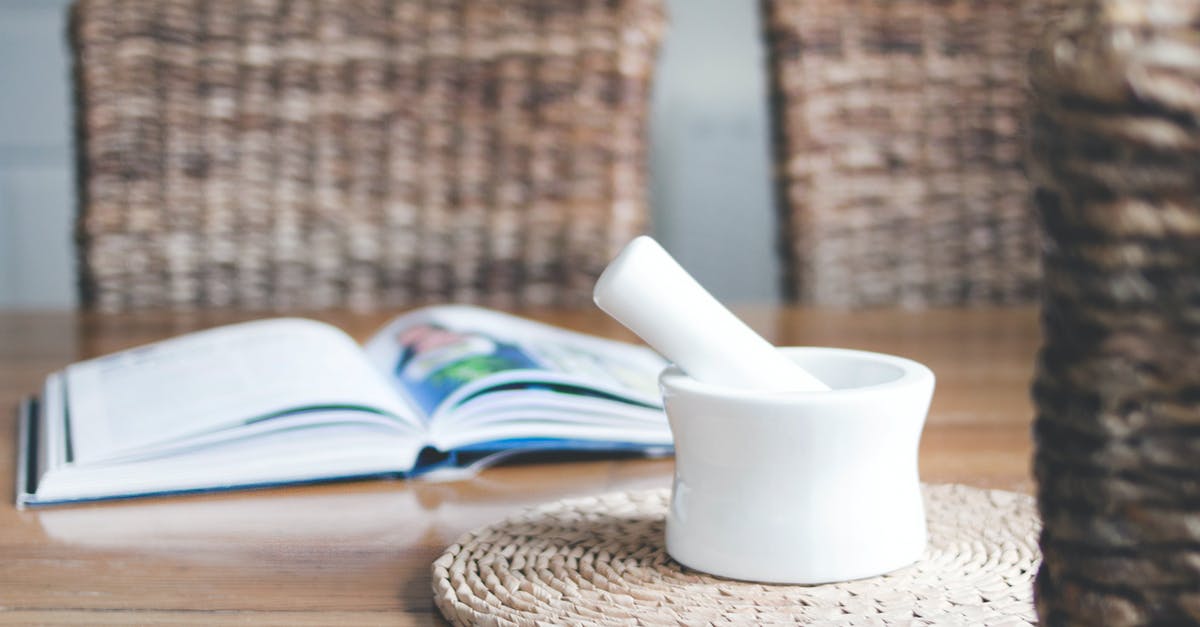 Good book on English/British cuisine - White Ceramic Mortar and Pestle Beside Book Good book on English/British cuisine - White Ceramic Mortar and Pestle Beside Book