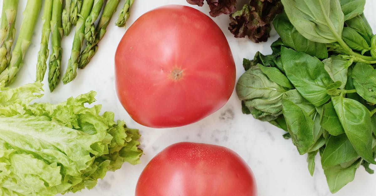 Green lettuce water? - Red Tomatoes Beside Green Vegetables Green lettuce water? - Red Tomatoes Beside Green Vegetables