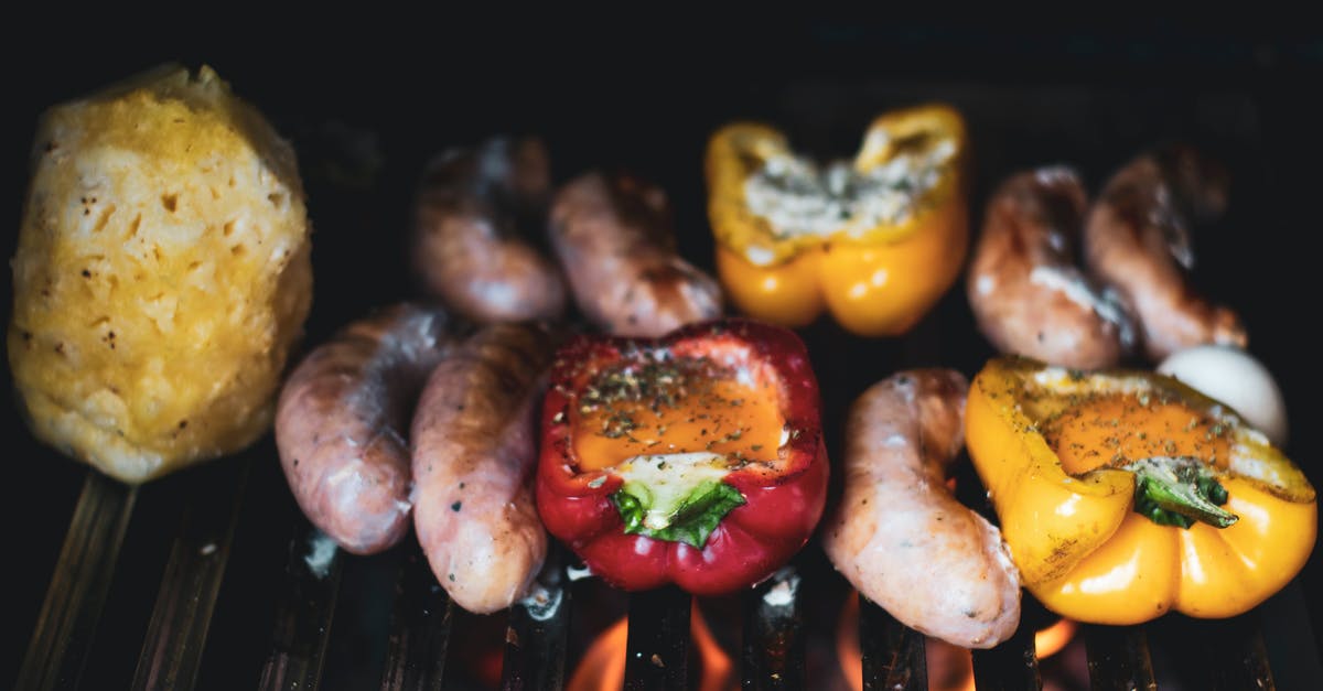 Grilling veggies & meat on same surface for vegetarian guests - Capsicums and Sausages on a Flame Griller Grilling veggies & meat on same surface for vegetarian guests - Capsicums and Sausages on a Flame Griller