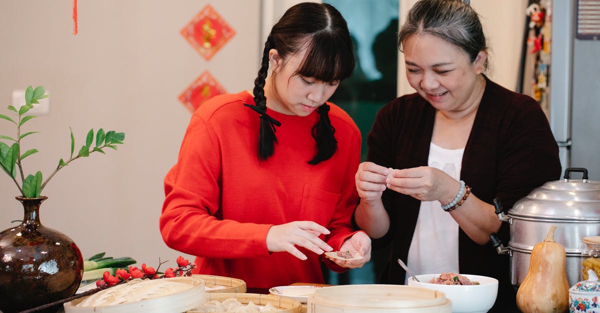 Ground beef storage and use past sell-by date - Cheerful Asian grandma with granddaughter filling dough while cooking dim sum at table with steamer and fresh squash Ground beef storage and use past sell-by date - Cheerful Asian grandma with granddaughter filling dough while cooking dim sum at table with steamer and fresh squash