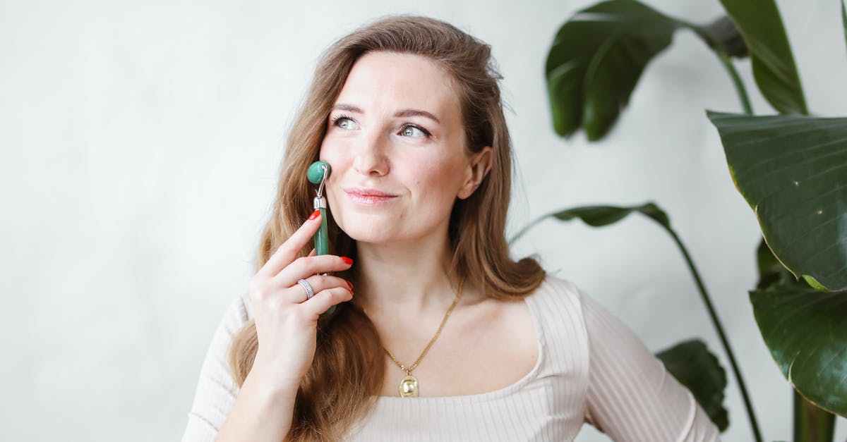 Guidance about using pith in marmalade - Woman in Beige Long Sleeve Shirt Holding a Jade Roller Guidance about using pith in marmalade - Woman in Beige Long Sleeve Shirt Holding a Jade Roller