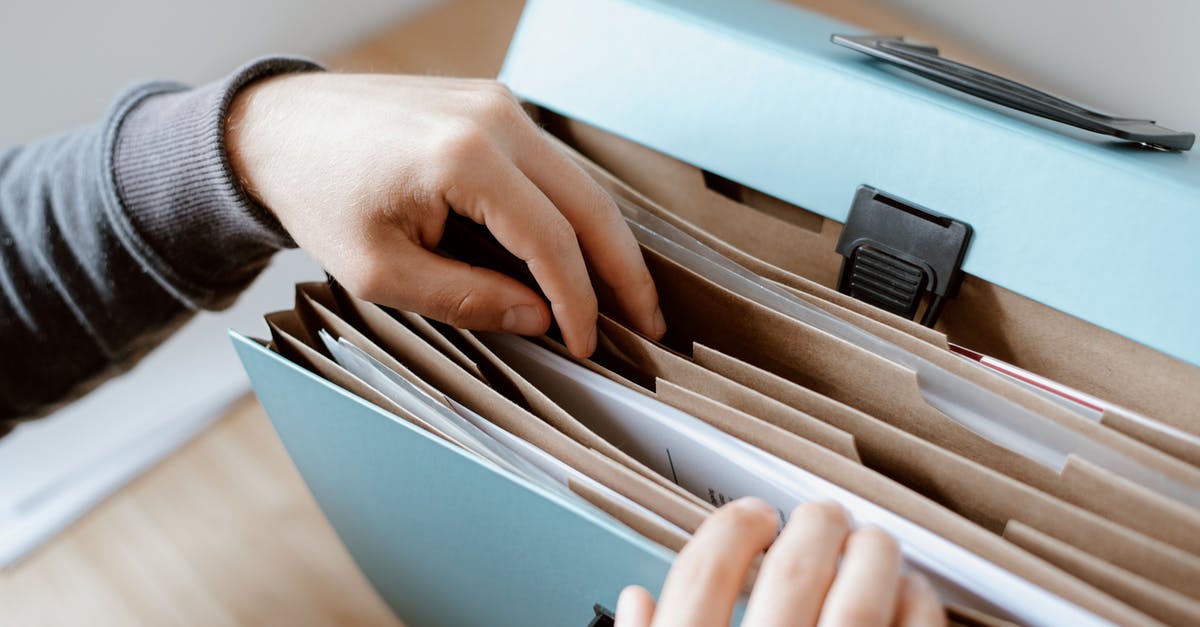 Gumbo file is slimey and too thick. - Person choosing document in folder Gumbo file is slimey and too thick. - Person choosing document in folder