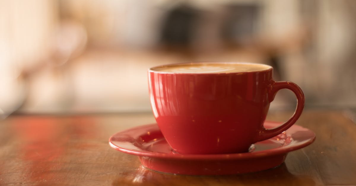 half-life of caffeine molecules - Red Ceramic Mug on Red Saucer half-life of caffeine molecules - Red Ceramic Mug on Red Saucer