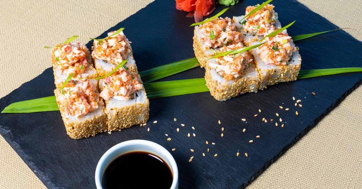 Healthy Boy Black Soy Sauce vs Healthy Boy Black Sweet Soy Sauce [duplicate] - Sliced Bread With Vegetable and Sauce