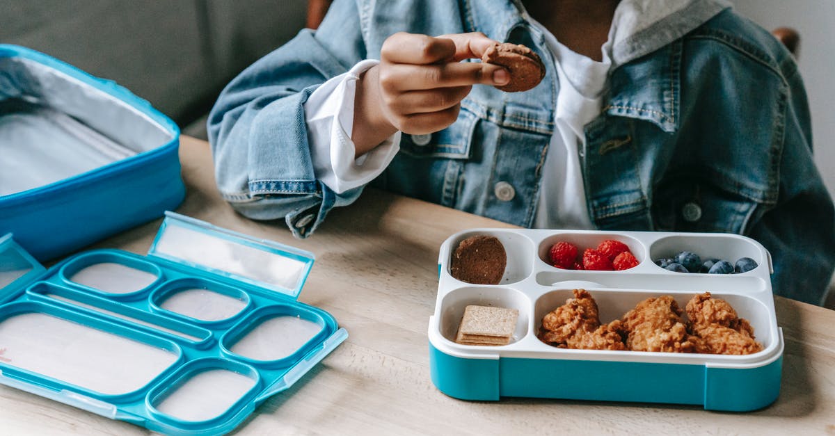 Healthy Boy Black Soy Sauce vs Healthy Boy Black Sweet Soy Sauce [duplicate] - Black boy in denim eating tasty breakfast in plastic container
