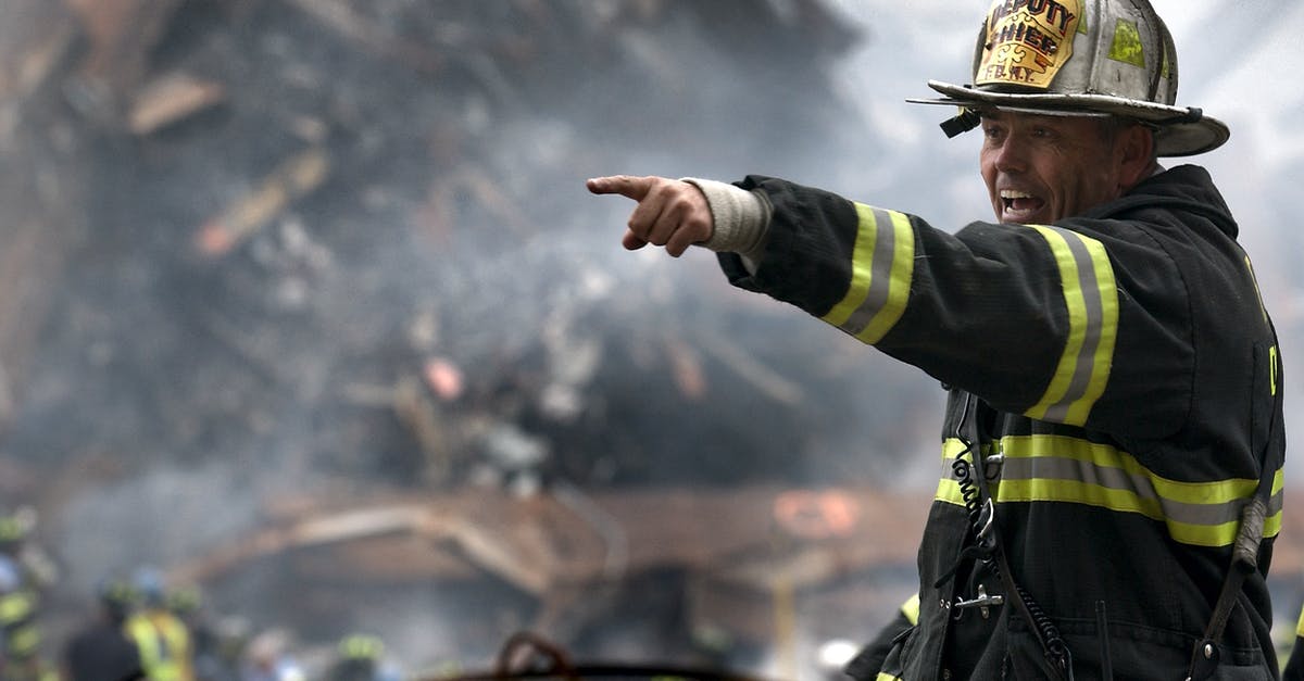 Help me rescue my bland soup - Fire Fighter Wearing Black and Yellow Uniform Pointing for Something Help me rescue my bland soup - Fire Fighter Wearing Black and Yellow Uniform Pointing for Something
