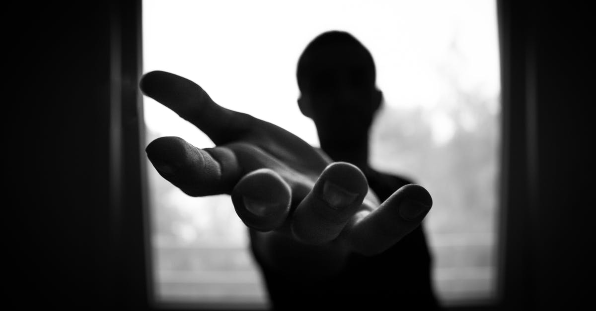 Help with rubbery roti/chapatti - Man's Hand in Shallow Focus and Grayscale Photography Help with rubbery roti/chapatti - Man's Hand in Shallow Focus and Grayscale Photography