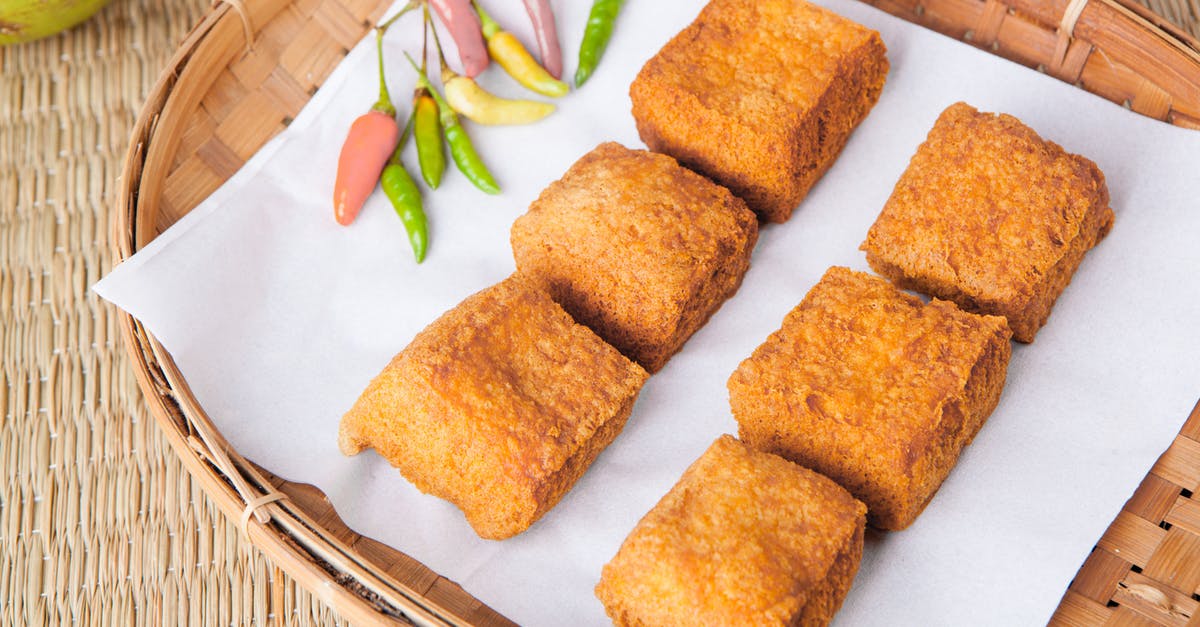 Homemade Tofu Firmness - Fried Tofu on Bamboo Tray Homemade Tofu Firmness - Fried Tofu on Bamboo Tray