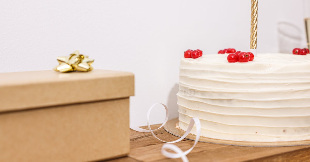 How can I bolster up a boxed cake mix? - A Close-Up Shot of a Cake and a Gift Box How can I bolster up a boxed cake mix? - A Close-Up Shot of a Cake and a Gift Box