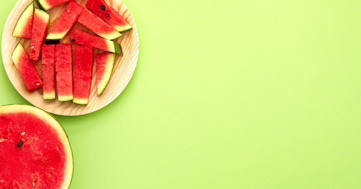 How can I check if a watermelon is sweet or not when buying? [duplicate] - Watermelon on Brown Tray