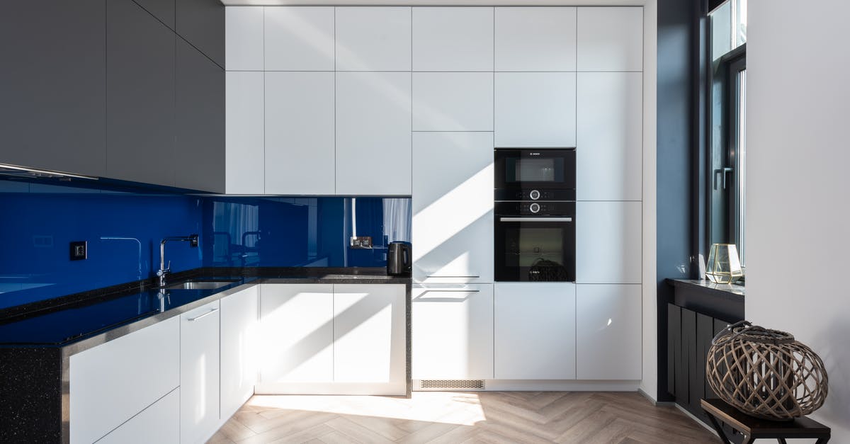 How can I clean my oven window? - Interior of modern kitchen with contemporary appliances How can I clean my oven window? - Interior of modern kitchen with contemporary appliances