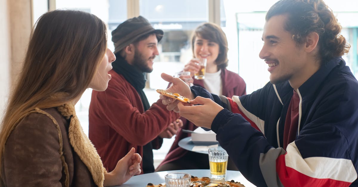 How can I create a sweet pizza that looks like pizza? - A Man Feeding a Woman a Slice of Pizza How can I create a sweet pizza that looks like pizza? - A Man Feeding a Woman a Slice of Pizza
