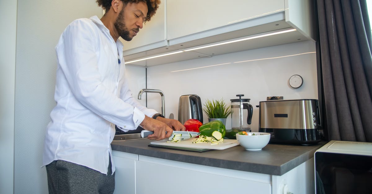 How can I dice vegetables on a small cutting board? - A Man Cutting a Vegetable How can I dice vegetables on a small cutting board? - A Man Cutting a Vegetable