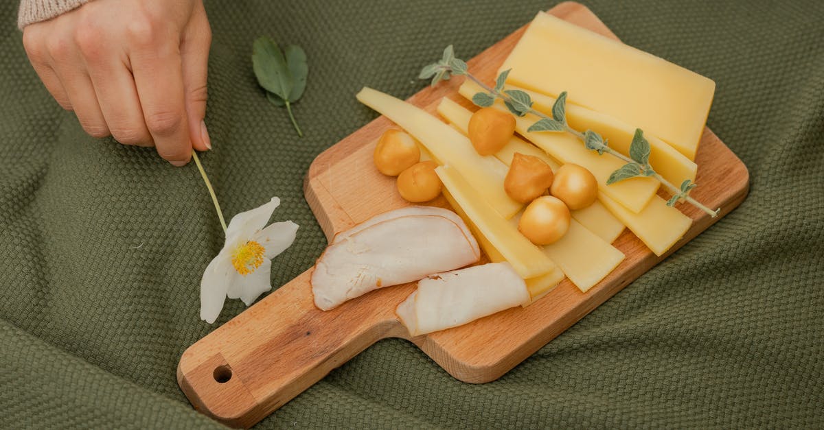 How can I find out how to make clothbound cheddar cheese? - Sliced Fruits on Brown Wooden Chopping Board How can I find out how to make clothbound cheddar cheese? - Sliced Fruits on Brown Wooden Chopping Board