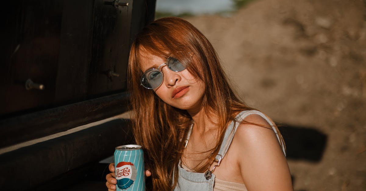 How can I get a better looking crust on my baguettes? - Woman Holding Soda Can How can I get a better looking crust on my baguettes? - Woman Holding Soda Can