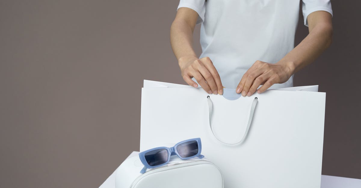 How can I improve sealing of bags for sous vide? - A Person Sealing a Shopping Bag How can I improve sealing of bags for sous vide? - A Person Sealing a Shopping Bag