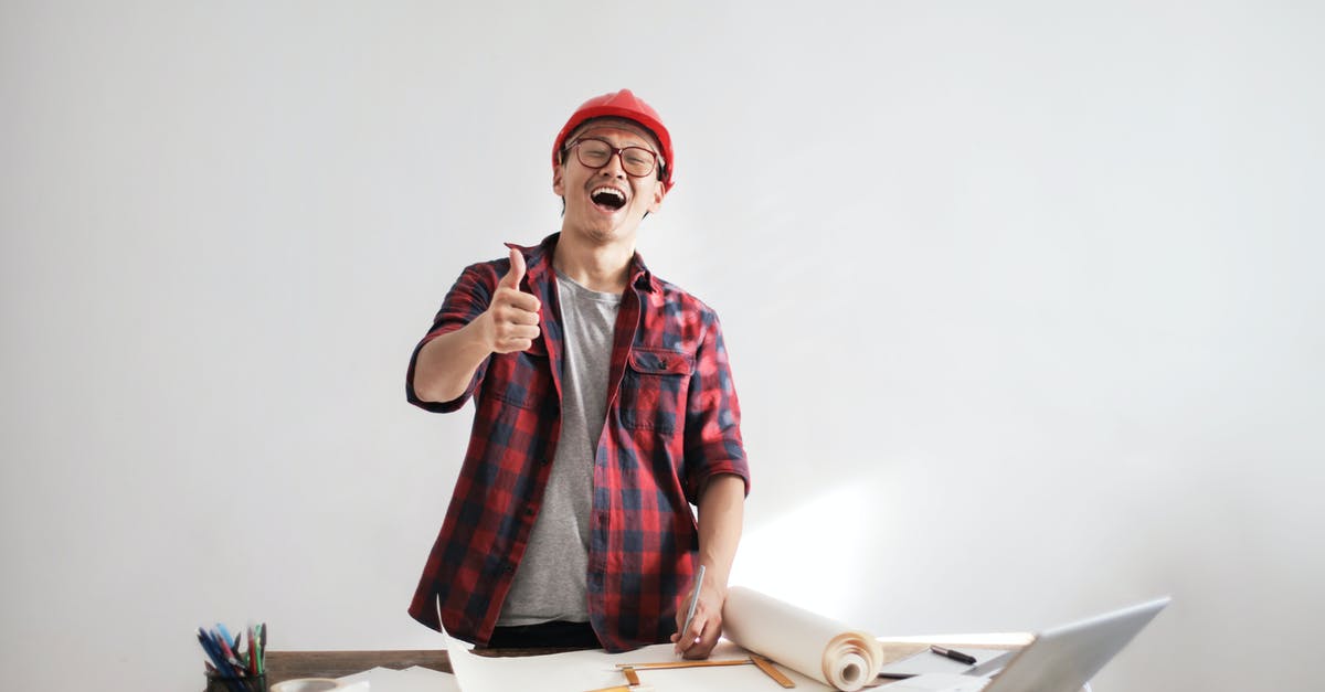 How can I improve the 2:1:1 margarita recipe? [closed] - Laughing male constructor showing thumb up at working desk