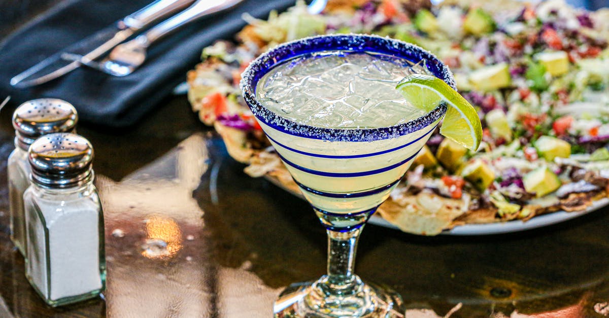 How can I improve the 2:1:1 margarita recipe? [closed] - Margarita Glass on Table