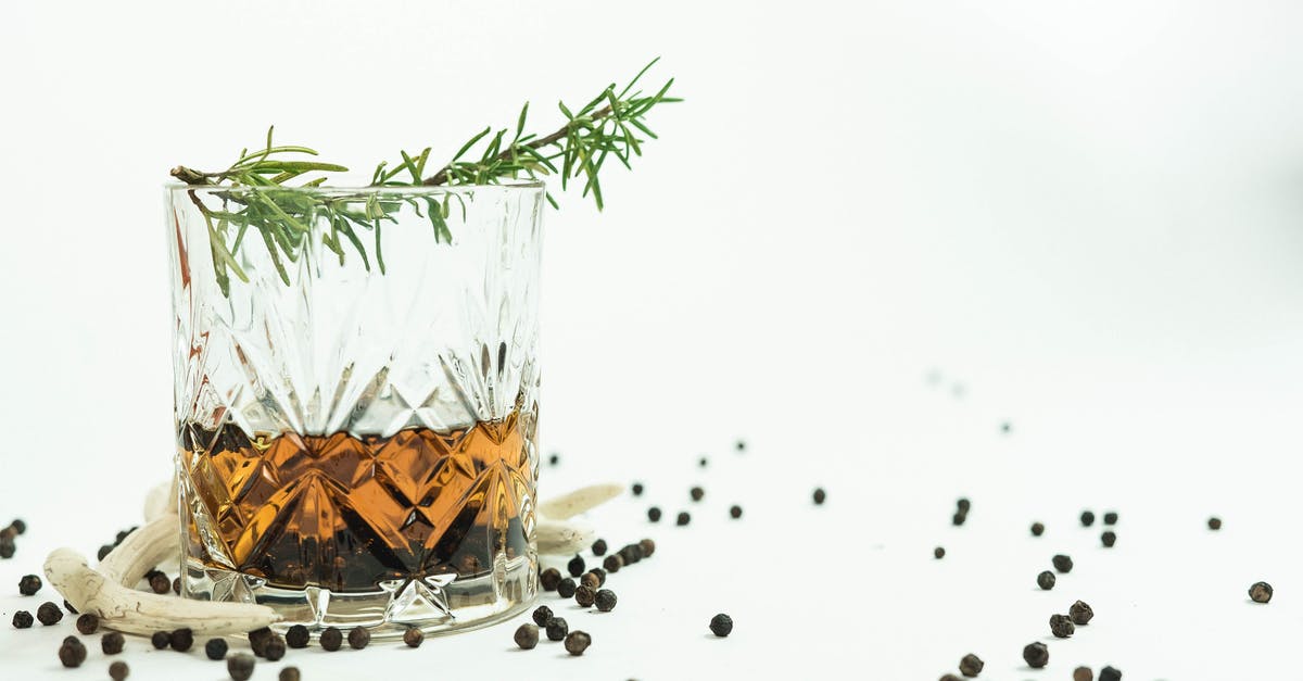 How can I infuse alcohol with 'fragile' herbs? - Glass of whiskey near peppercorns How can I infuse alcohol with 'fragile' herbs? - Glass of whiskey near peppercorns