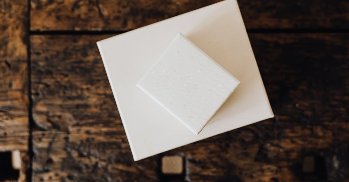 How can I keep meringue pie-topping from falling? - Stack of white carton boxes on wooden table How can I keep meringue pie-topping from falling? - Stack of white carton boxes on wooden table
