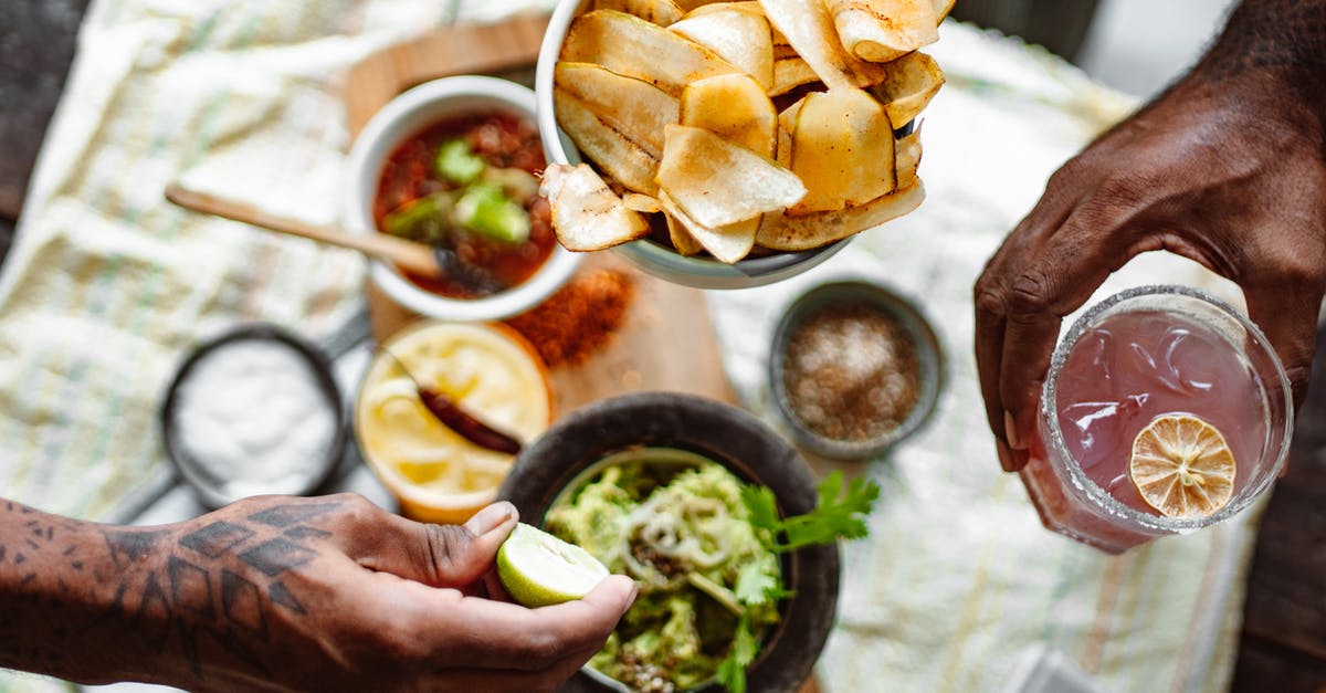 How can I keep my salad cold in the microwave? - Three Unrecognizable Hands Holding Chips Lime and Cold Fruit Drink How can I keep my salad cold in the microwave? - Three Unrecognizable Hands Holding Chips Lime and Cold Fruit Drink