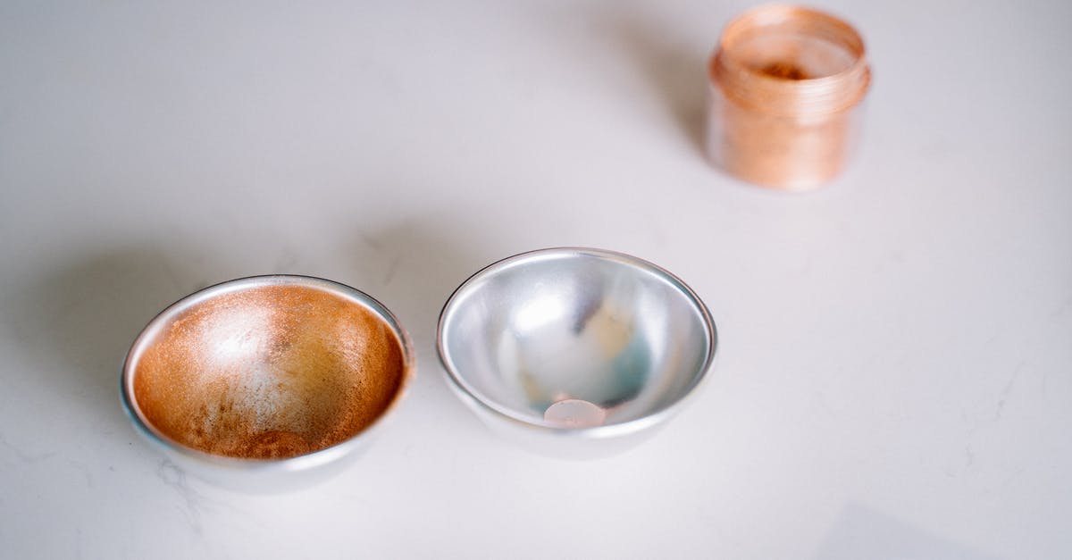 How can I make a chocolate syrup that can be frozen? [duplicate] - Three Brown and Silver Round Containers on White Table
