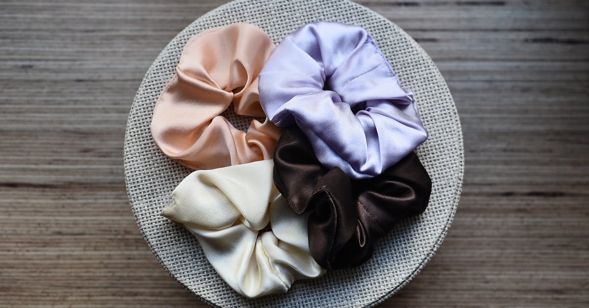 How can I make a silky smooth, rich mash? - Overhead view of assorted silky hair bands on round shaped box on wooden table How can I make a silky smooth, rich mash? - Overhead view of assorted silky hair bands on round shaped box on wooden table