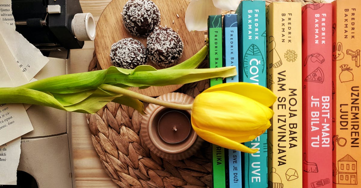 How can I make dry coconut from fresh coconut meat? - Top view stack of books on table near beautiful yellow tulip and orchid flowers arranged with chocolate truffles placed on wicker placemat How can I make dry coconut from fresh coconut meat? - Top view stack of books on table near beautiful yellow tulip and orchid flowers arranged with chocolate truffles placed on wicker placemat