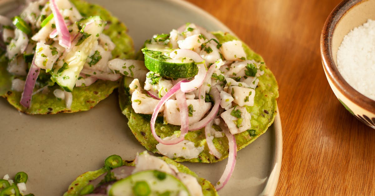 How can I make my baked tortilla chips crispier? - A Plate of Tostadas in Close-up Photography How can I make my baked tortilla chips crispier? - A Plate of Tostadas in Close-up Photography