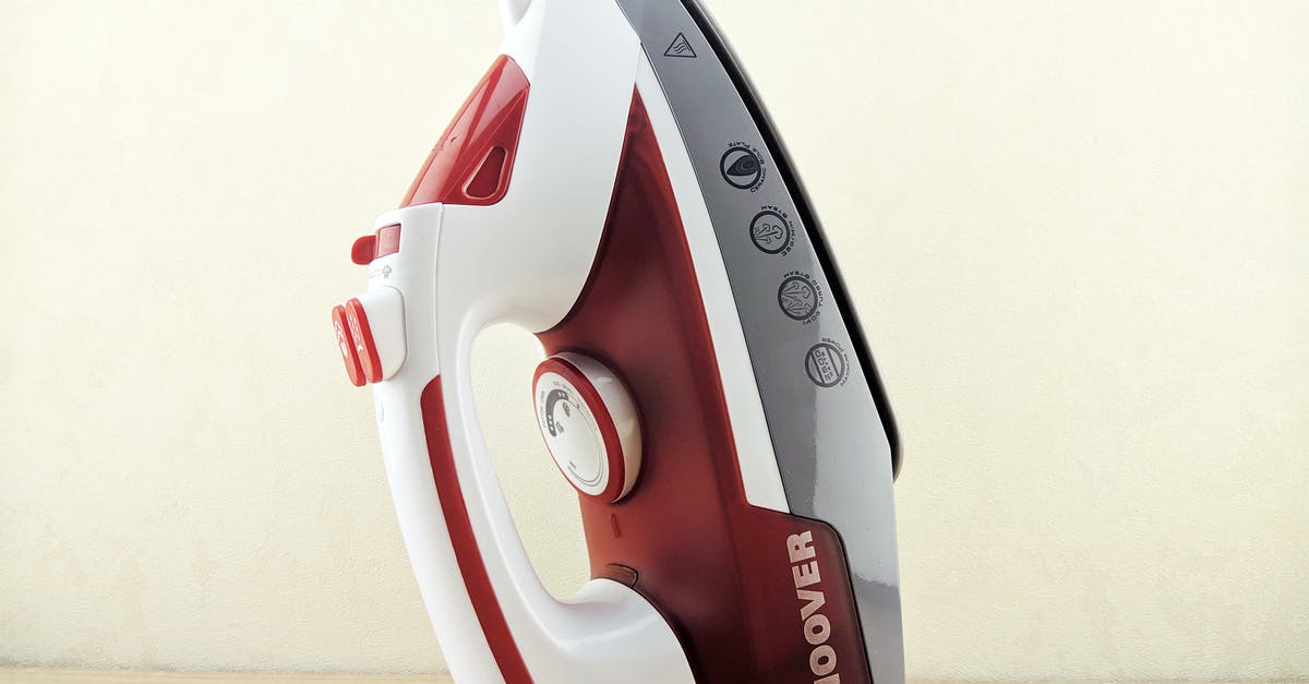 How can I mill / press sweet sorghum with household equipment? - Contemporary multi functional wired iron of white and red colors placed on heel rest on white surface How can I mill / press sweet sorghum with household equipment? - Contemporary multi functional wired iron of white and red colors placed on heel rest on white surface