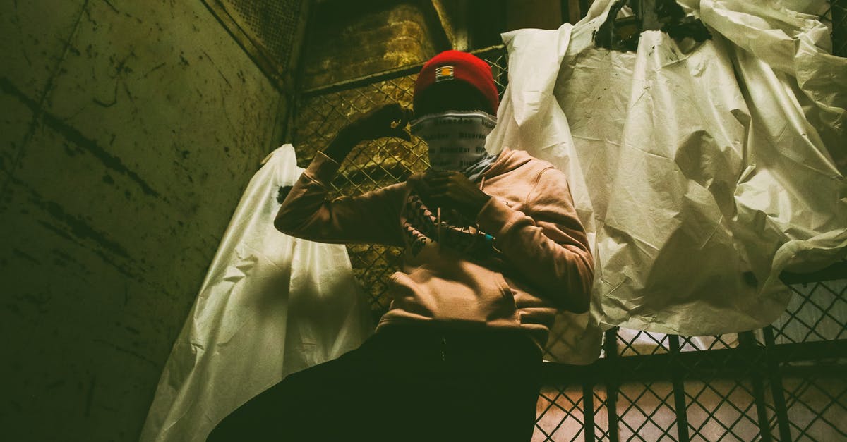 How can I prevent my Béarnaise sauce from thickening over night? - From below of anonymous ethnic male in textile mask against rough walls at dusk How can I prevent my Béarnaise sauce from thickening over night? - From below of anonymous ethnic male in textile mask against rough walls at dusk