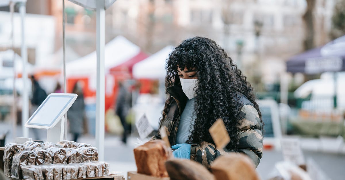 How can I prevent pastry becoming soggy when it has a filling and is stored overnight? - Young African American female in warm casual outfit and medical mask looking at showcase with various breads at street fair How can I prevent pastry becoming soggy when it has a filling and is stored overnight? - Young African American female in warm casual outfit and medical mask looking at showcase with various breads at street fair