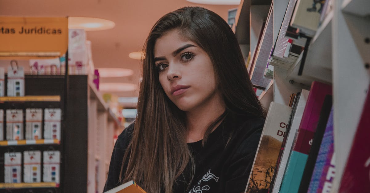 How can I store Brie for a long period? - Woman in Black Top Leaning by Bookcase How can I store Brie for a long period? - Woman in Black Top Leaning by Bookcase