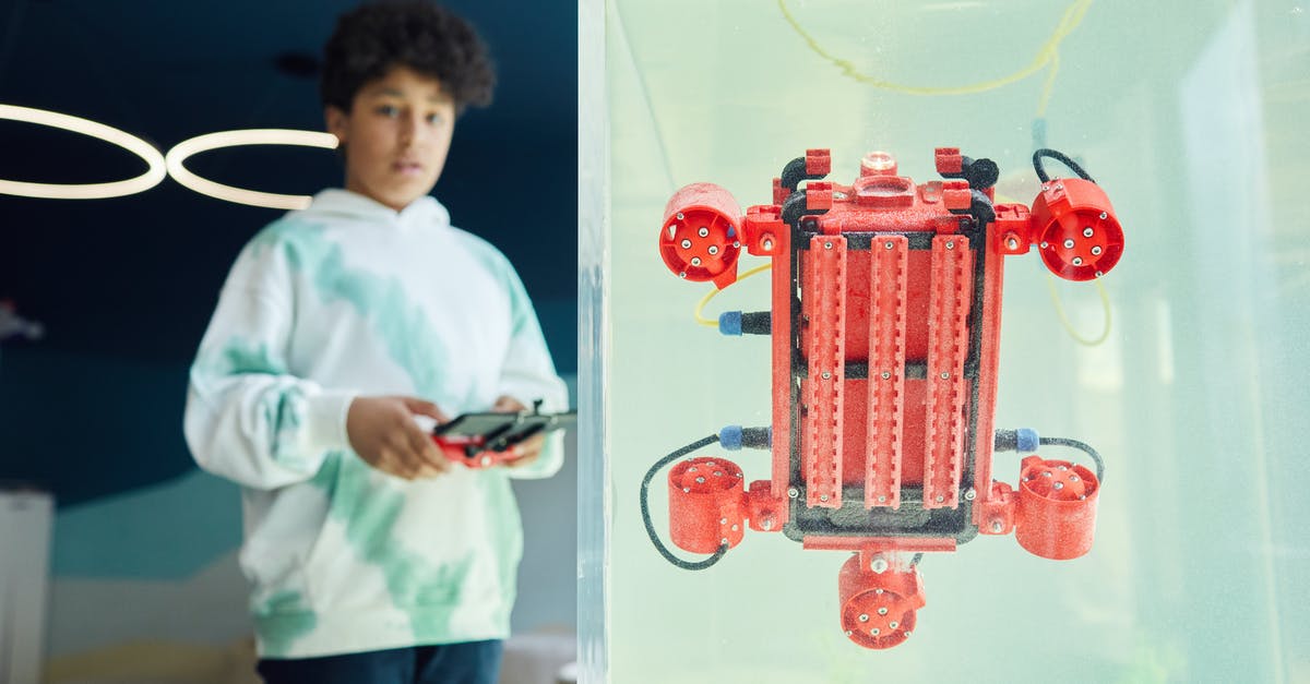 How can I translate my bread machine recipe to using a stand mixer instead? - From below of ethnic boy in hoodie controlling robot using panel while standing in light room How can I translate my bread machine recipe to using a stand mixer instead? - From below of ethnic boy in hoodie controlling robot using panel while standing in light room