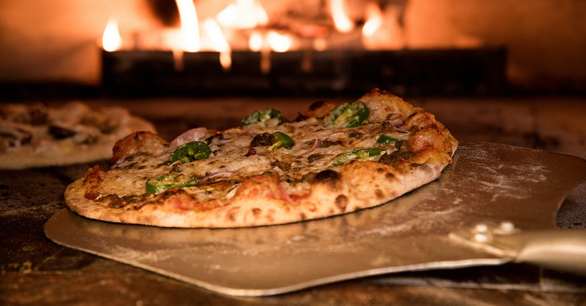 How can you make a sauce less spicy/hot? - Baked Pizza on Pizza Peel in Oven