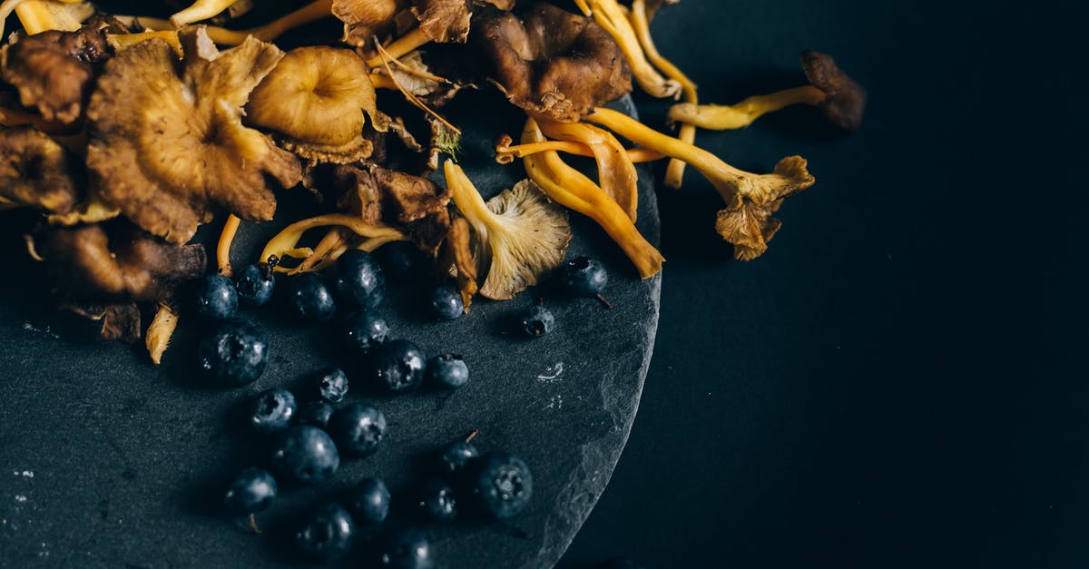 How common are worms in dried mushrooms? - Blueberries and Mushrooms on Black Round Surface How common are worms in dried mushrooms? - Blueberries and Mushrooms on Black Round Surface