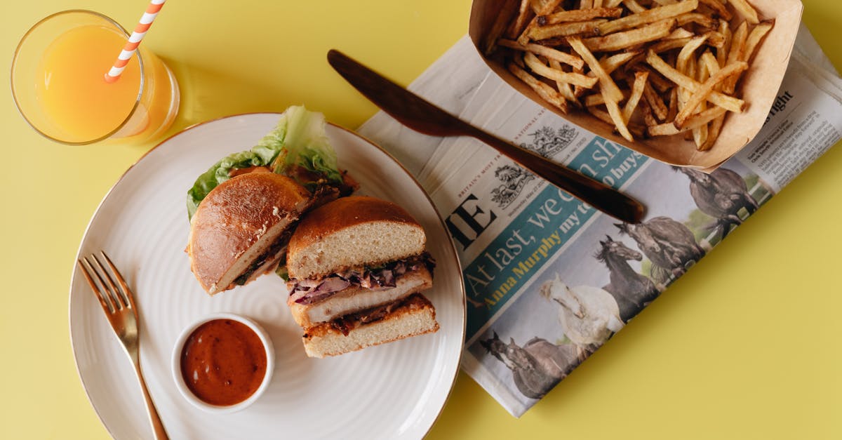 How could buffalo chicken dip be stabilized? - Burger on White Ceramic Plate Beside Fries and Glass of Juice
