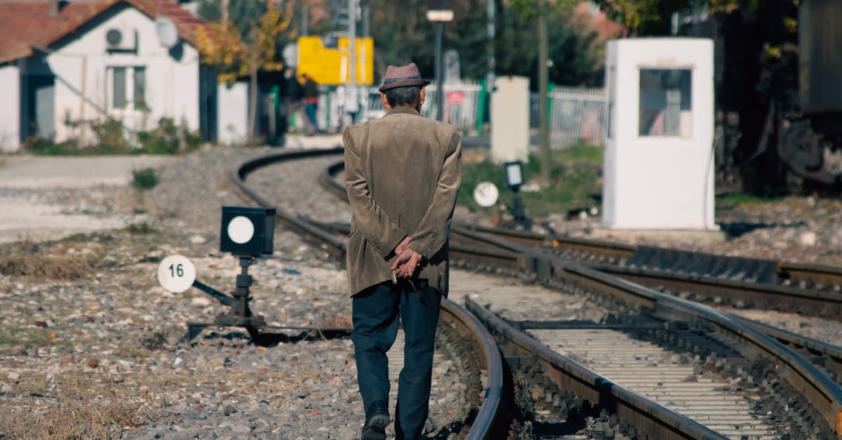 How dangerous is rye? - Man in Brown Jacket and Black Pants Standing on Train Rail How dangerous is rye? - Man in Brown Jacket and Black Pants Standing on Train Rail
