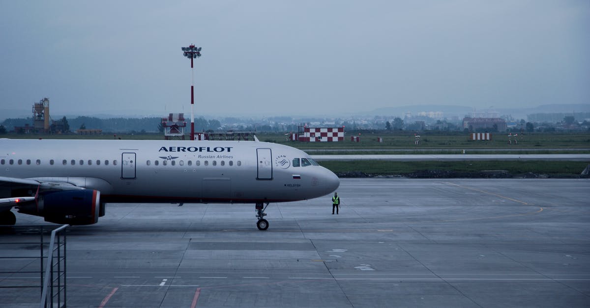 How do commercial operations defrost large amounts - White Aeroflot Passenger Plane on Airport How do commercial operations defrost large amounts - White Aeroflot Passenger Plane on Airport