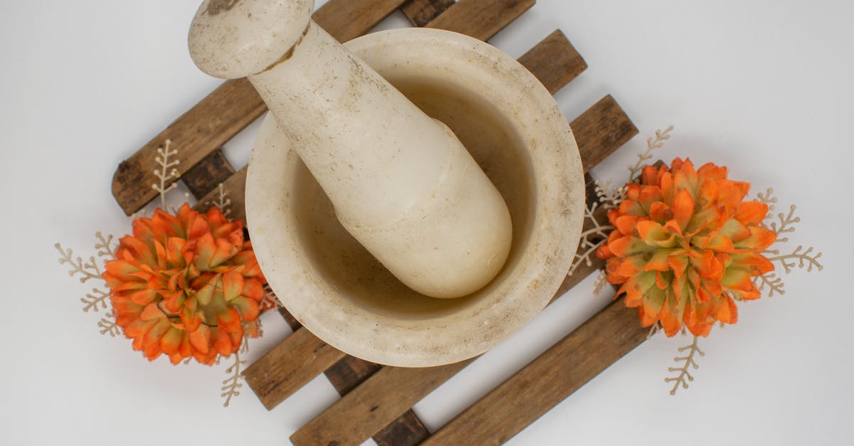 How do cooking utensils remain safe for use? - White Pestle on Brown Wooden Board with Orange Flowers How do cooking utensils remain safe for use? - White Pestle on Brown Wooden Board with Orange Flowers