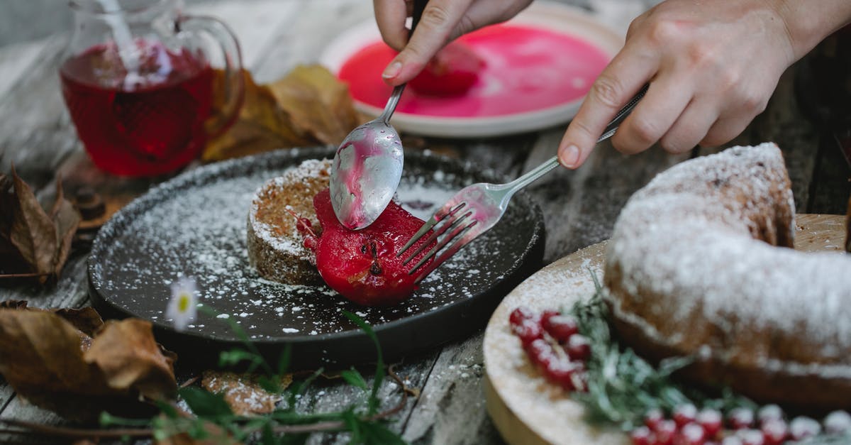How do I add flavor to this amazing looking dish? - Crop faceless housewife garnishing cake with baked pear How do I add flavor to this amazing looking dish? - Crop faceless housewife garnishing cake with baked pear