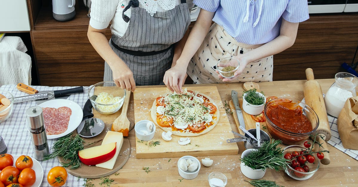 How do I add menthol flavoring to this gum? - Crop women adding spices on pizza How do I add menthol flavoring to this gum? - Crop women adding spices on pizza