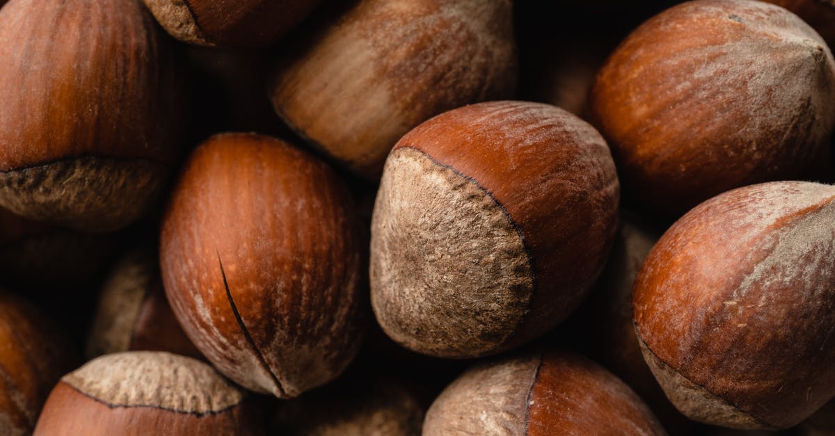 How do I brown nuts without burning and without taking forever? - Close-Up Shot of Hazelnuts How do I brown nuts without burning and without taking forever? - Close-Up Shot of Hazelnuts