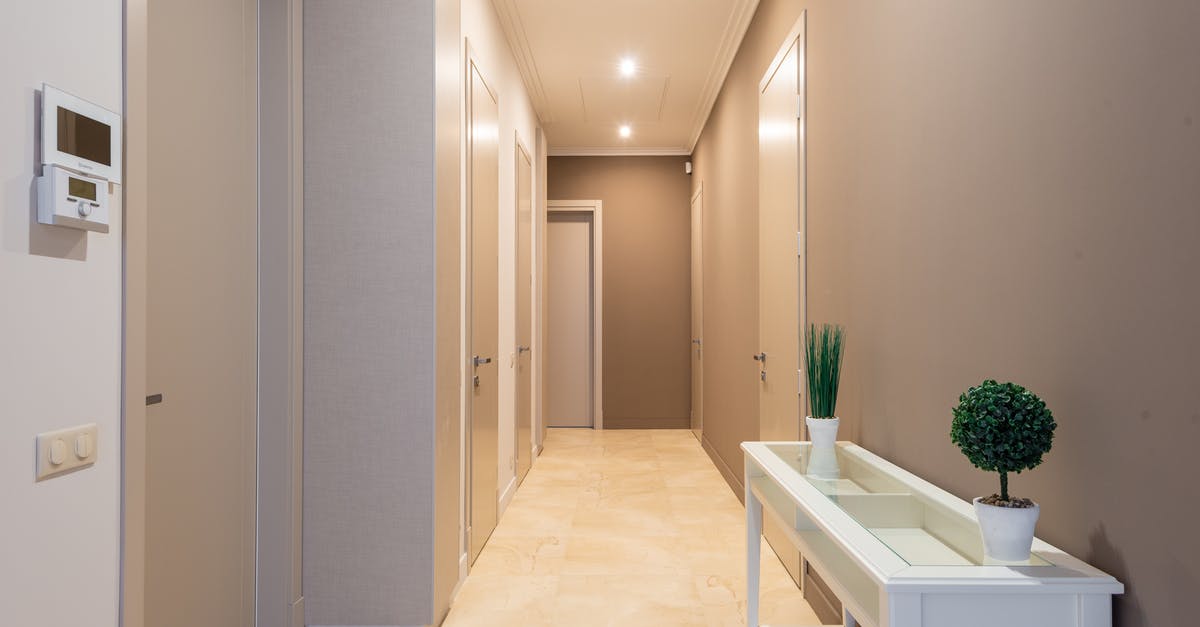 How do I clean a pot after boiling eggs? - Spacious hallway with gray doors How do I clean a pot after boiling eggs? - Spacious hallway with gray doors