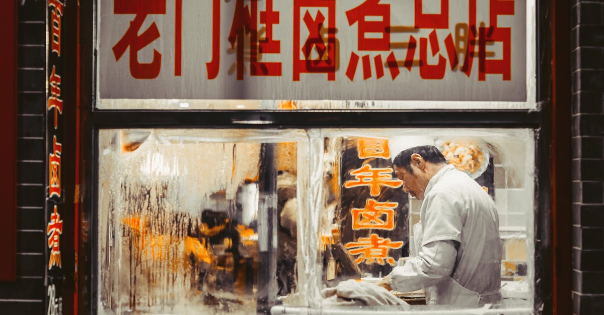 How do I cook ribs Chinese style? - Man Working Inside The Kitchen How do I cook ribs Chinese style? - Man Working Inside The Kitchen