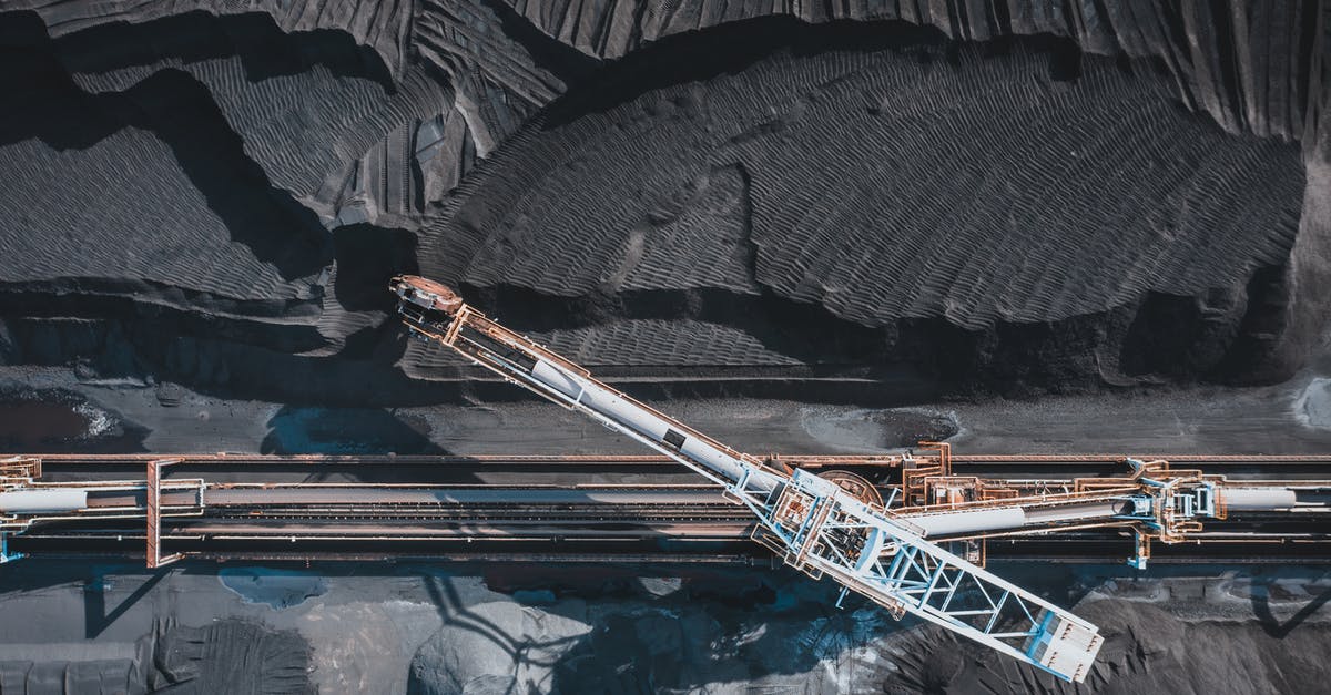 How do I finely process/puree a large amount of chillies? - Top view of modern industrial machinery working with black natural coal in daylight How do I finely process/puree a large amount of chillies? - Top view of modern industrial machinery working with black natural coal in daylight