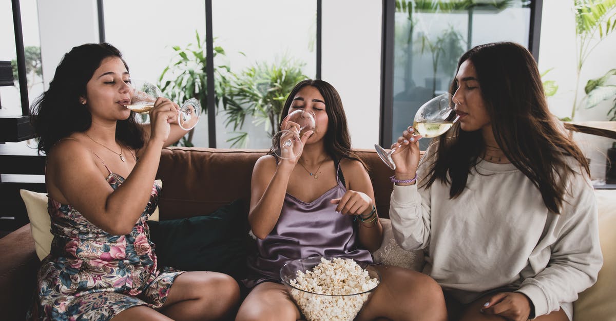 How do I get my home-popped popcorn to be as dry as bagged popcorn? - A Group of Friends Drinking Wine while Sitting on the Couch How do I get my home-popped popcorn to be as dry as bagged popcorn? - A Group of Friends Drinking Wine while Sitting on the Couch