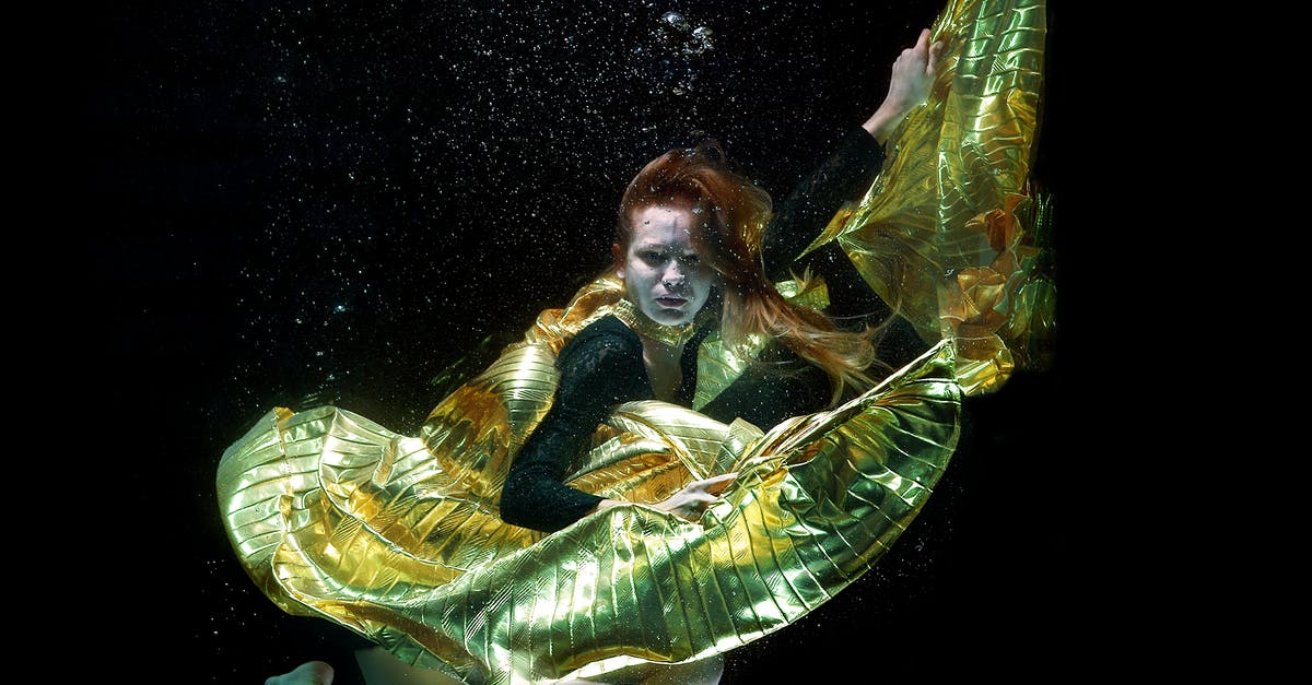 How do I know if water in supermarket's seafood tank is salty enough? - Underwater Photo of Woman Wearing Green and Black Dress How do I know if water in supermarket's seafood tank is salty enough? - Underwater Photo of Woman Wearing Green and Black Dress