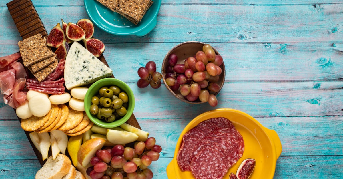 How do I recognize whether a Gorgonzola has gone bad? - Assorted Cheese and Fruits on a Wooden Board How do I recognize whether a Gorgonzola has gone bad? - Assorted Cheese and Fruits on a Wooden Board