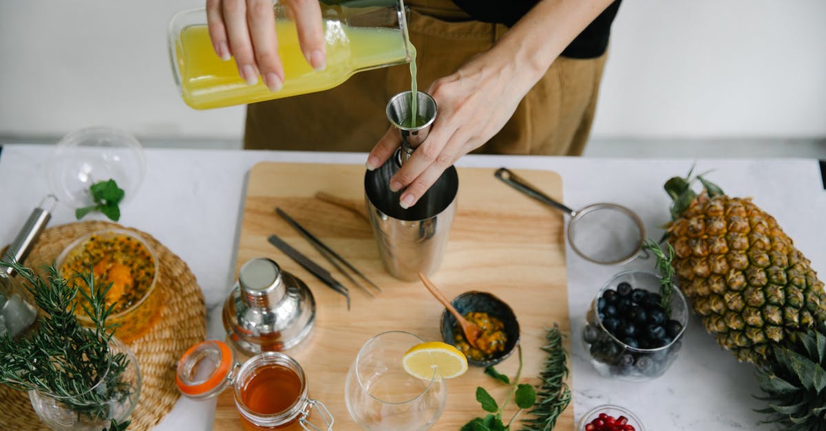 How do I reduce the acidity of homemade honey lemon juice? - A Person Pouring Juice on a Jigger How do I reduce the acidity of homemade honey lemon juice? - A Person Pouring Juice on a Jigger